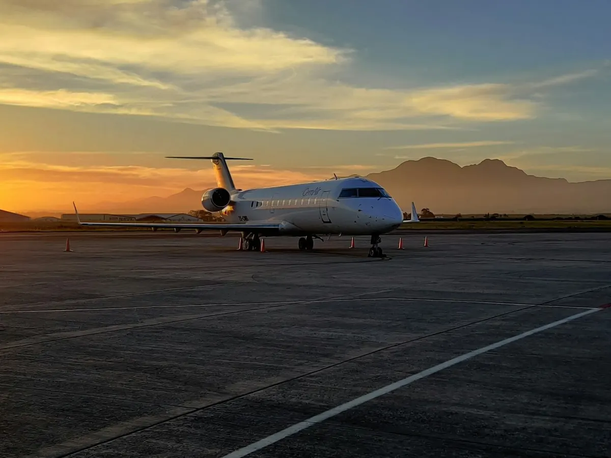 Business jet on the apron at sunset