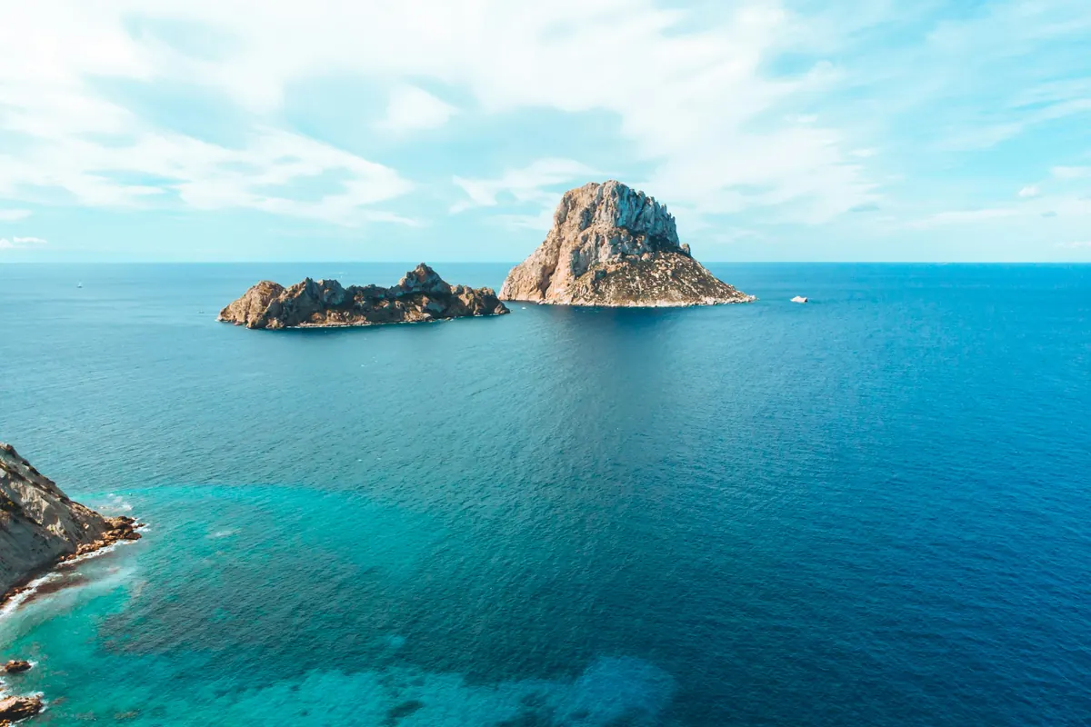 Es Vedra rising from turquoise water off Ibiza